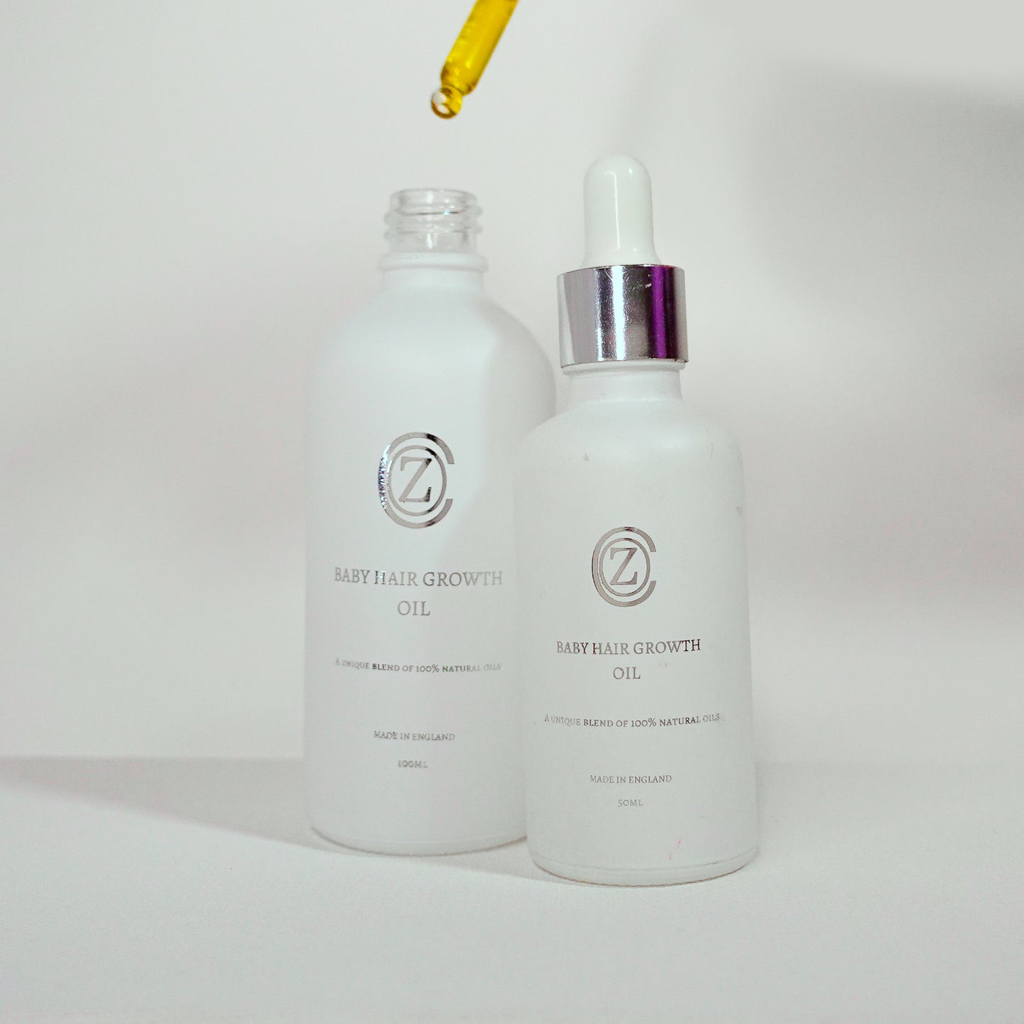 Baby hair and body oil