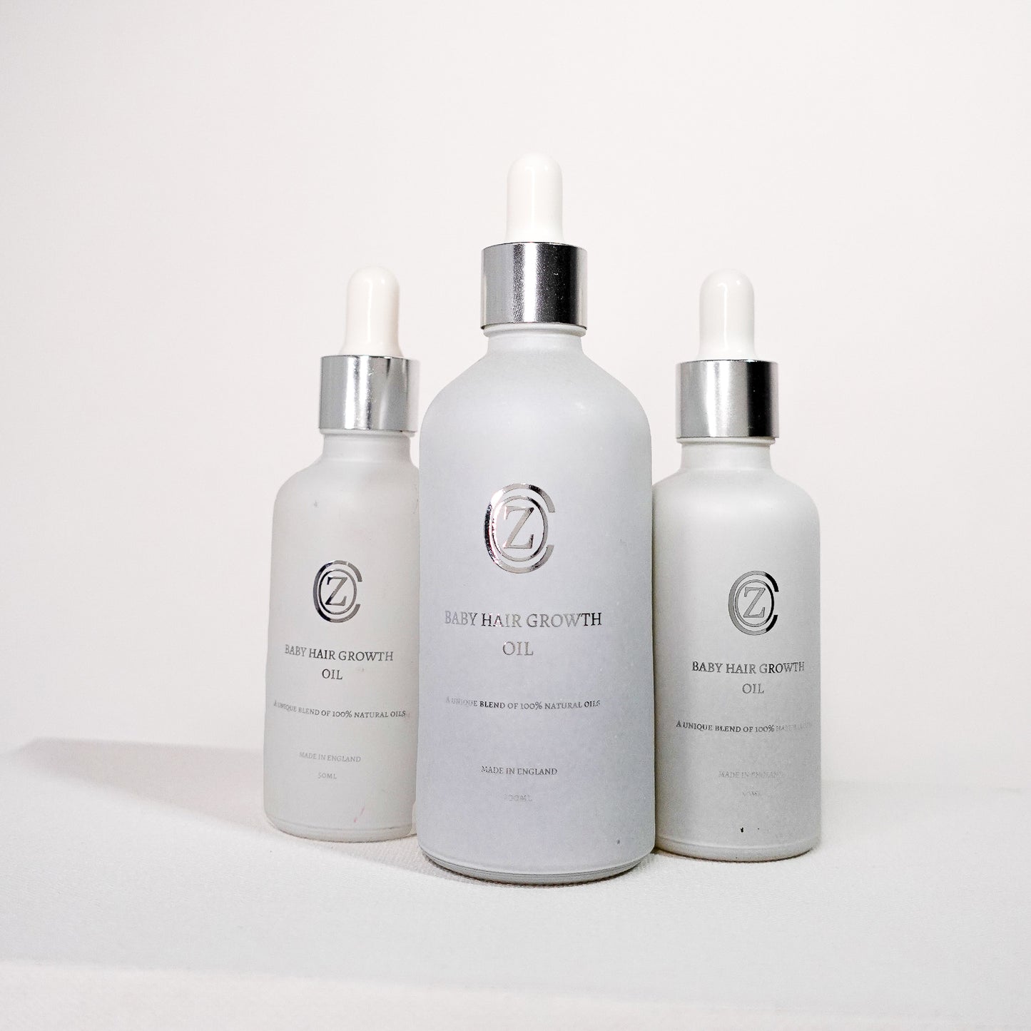 Baby hair and body oil